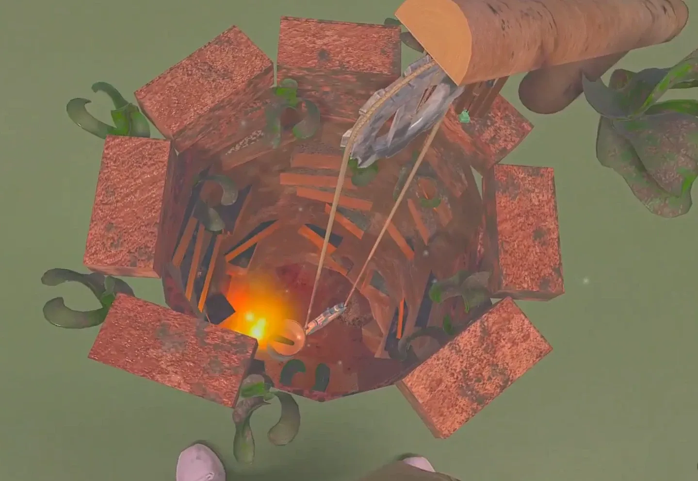 Looking straight down the brick well, a rope leading to a glowing light far below and the player's feet in view